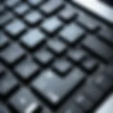 Close-up view of a laptop keyboard highlighting unresponsive keys.